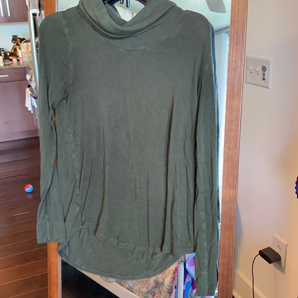 Green turtleneck sweater